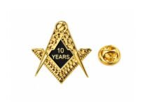 Gold Masonic square and compass lapel pin with black enamel center reading 10 Years