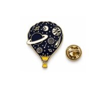 Gold and navy enamel hot air balloon pin with planets and stars and gold butterfly clutch